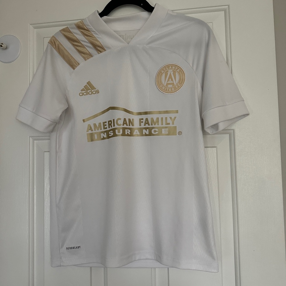 Atlanta United FC white and gold youth jersey